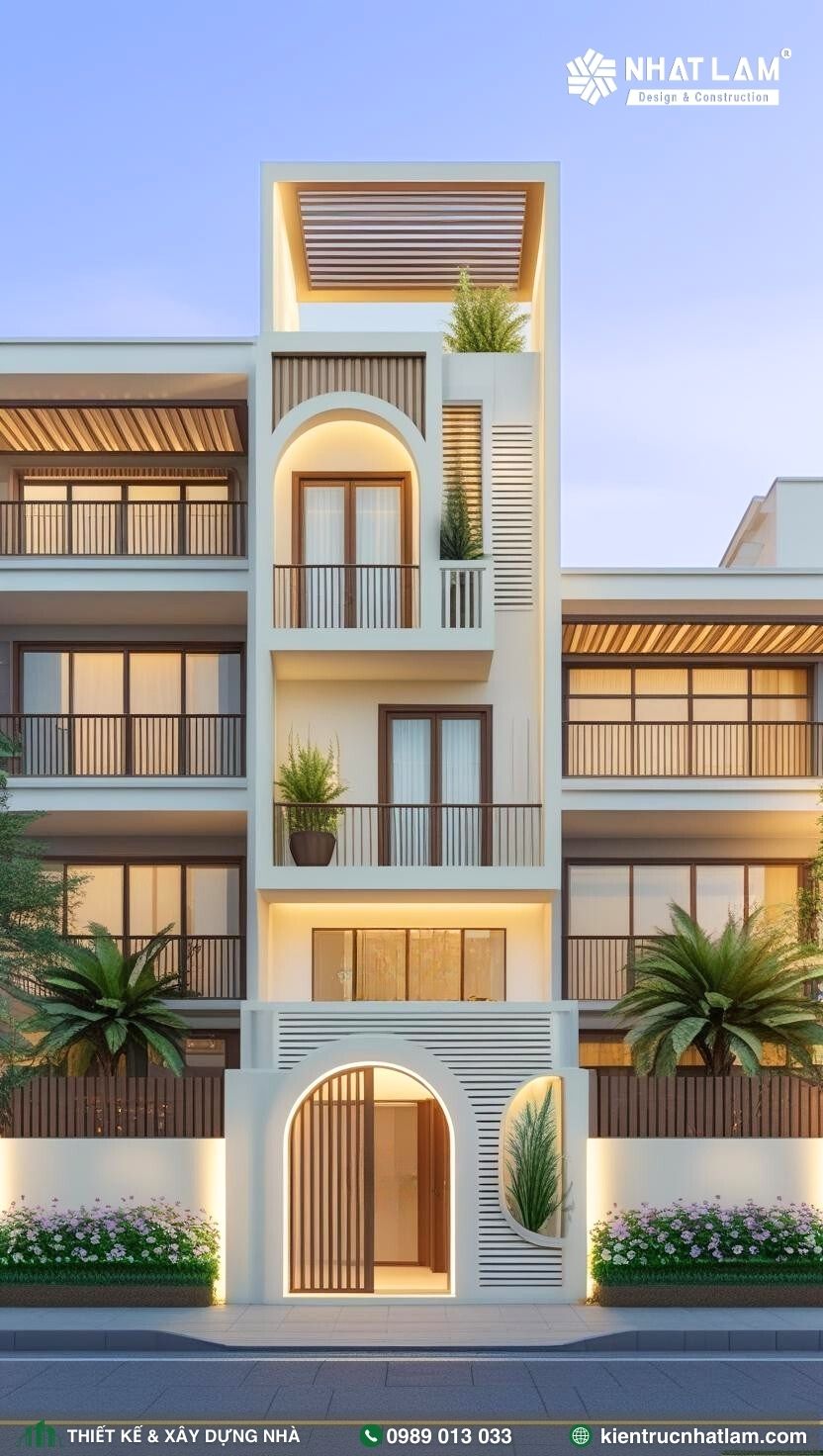 🏡 Thiết kế 3 tầng 1 tum ấn tượng với mặt tiền rộng rãi, hệ thống vòm cong liên kết tinh tế và các mảng tường kẻ sọc nổi bật. Mẫu nhà mang phong cách hiện đại kết hợp hơi hướng Á Đông, phù hợp với gia đình yêu thích sự sang trọng và ấm cúng.